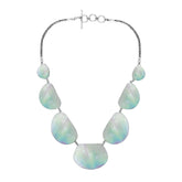 Women’s sterling silver necklace with freeform Mother of Pearl stones and Bali-inspired accents.